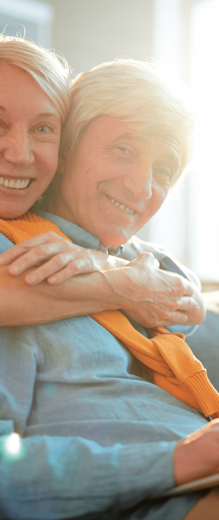 Couple hugging and smiling